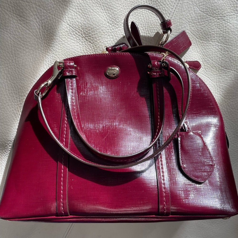 COACH satchel/crossbody of rich merlot smooth leather 13" x 10", 2-way top zip.